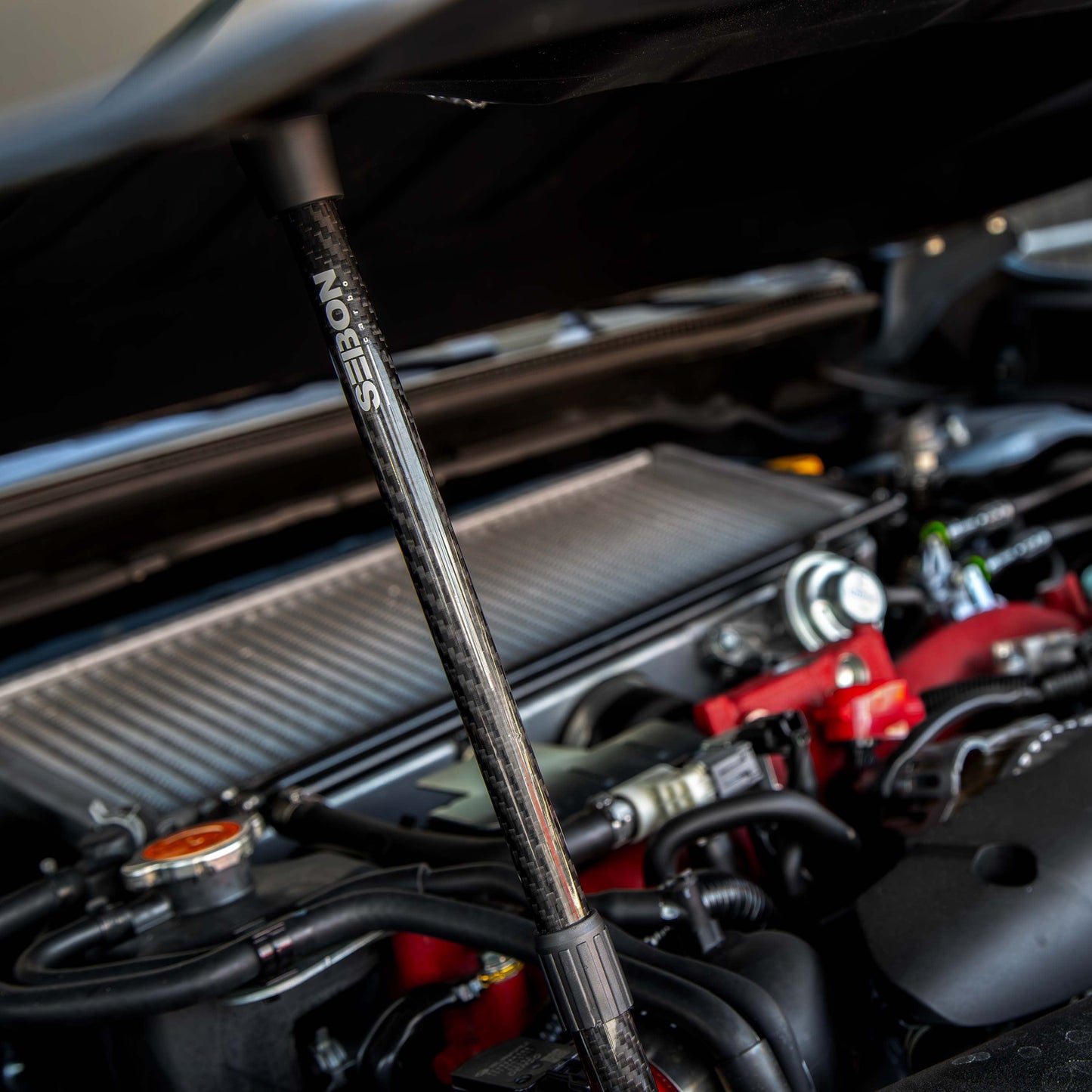 Seibon HOODPROP-S Carbon fiber hood prop with Seibon logo