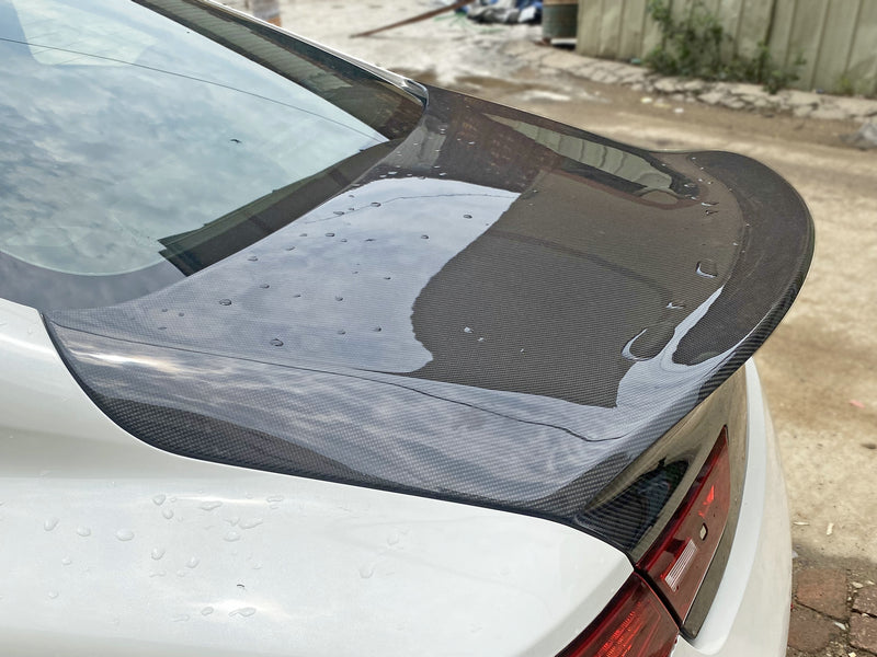 Q60 Trunk lid with molded spoiler